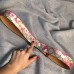 Gucci GG Blooms canvas belt with interlocking G