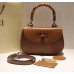 Gucci Vintage Leather Bamboo Top Handle Bag In Brown With A Mini Mirror