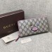 Gucci zip around wallet with embroidered face 431392 pink