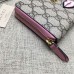 Gucci zip around wallet with embroidered face 431392 pink