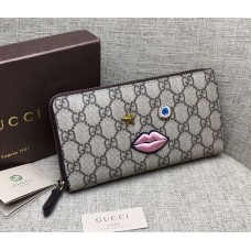 Gucci zip around wallet with embroidered face 431392 black