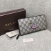 Gucci zip around wallet with embroidered face 431392 black