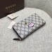 Gucci zip around wallet with embroidered face 431392 black