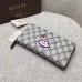 Gucci zip around wallet with embroidered face 431392 black