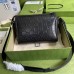 Gucci Messenger Bag In Black GG Embossed Perforated Leather