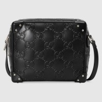 Gucci Trunks Messenger Bag In Black GG Embossed Perforated Leather