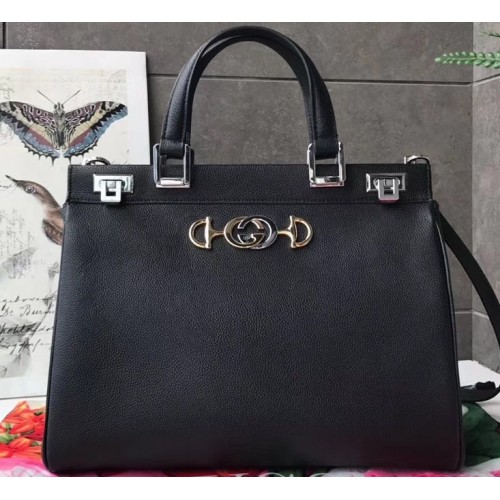 ladies zumi grainy leather medium top handle bag in black