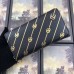 Gucci Black Zip Around Wallet With Double G stripe